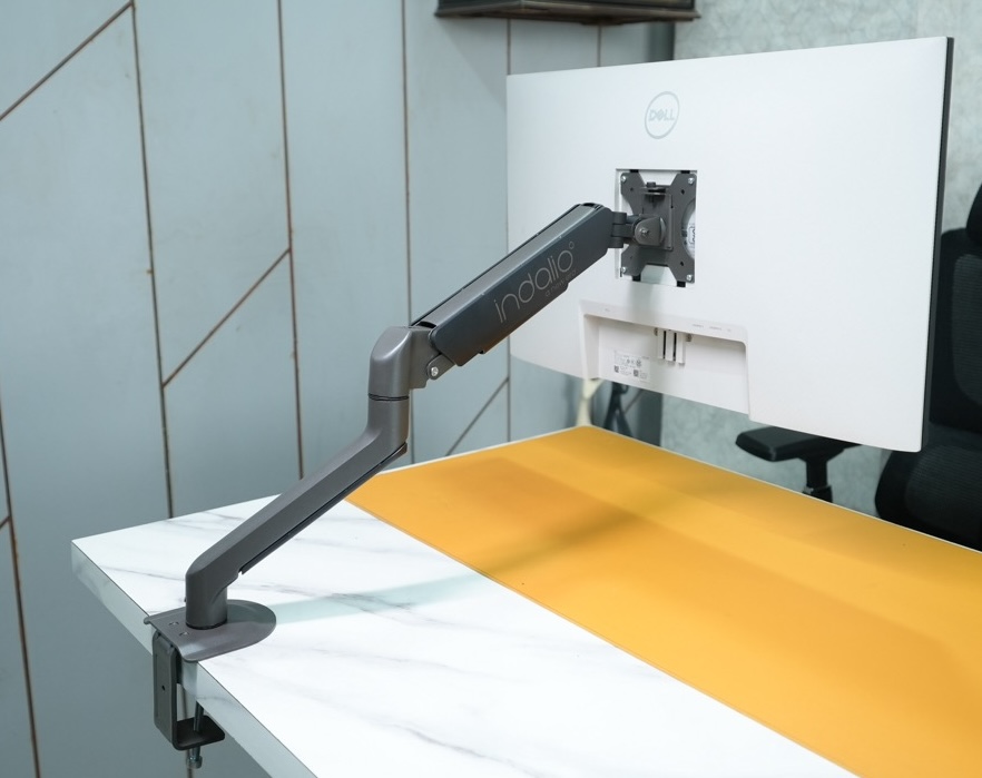 Indalio single Gas Spring Monitor Arm on a desk